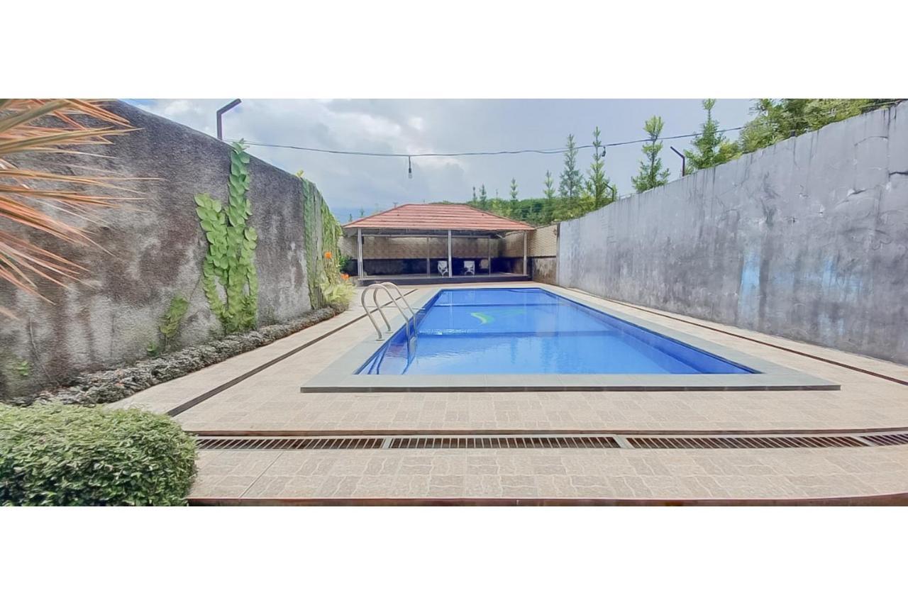 Hotel Sri Indrawati Puncak Mitra Reddoorz 茂物 外观 照片
